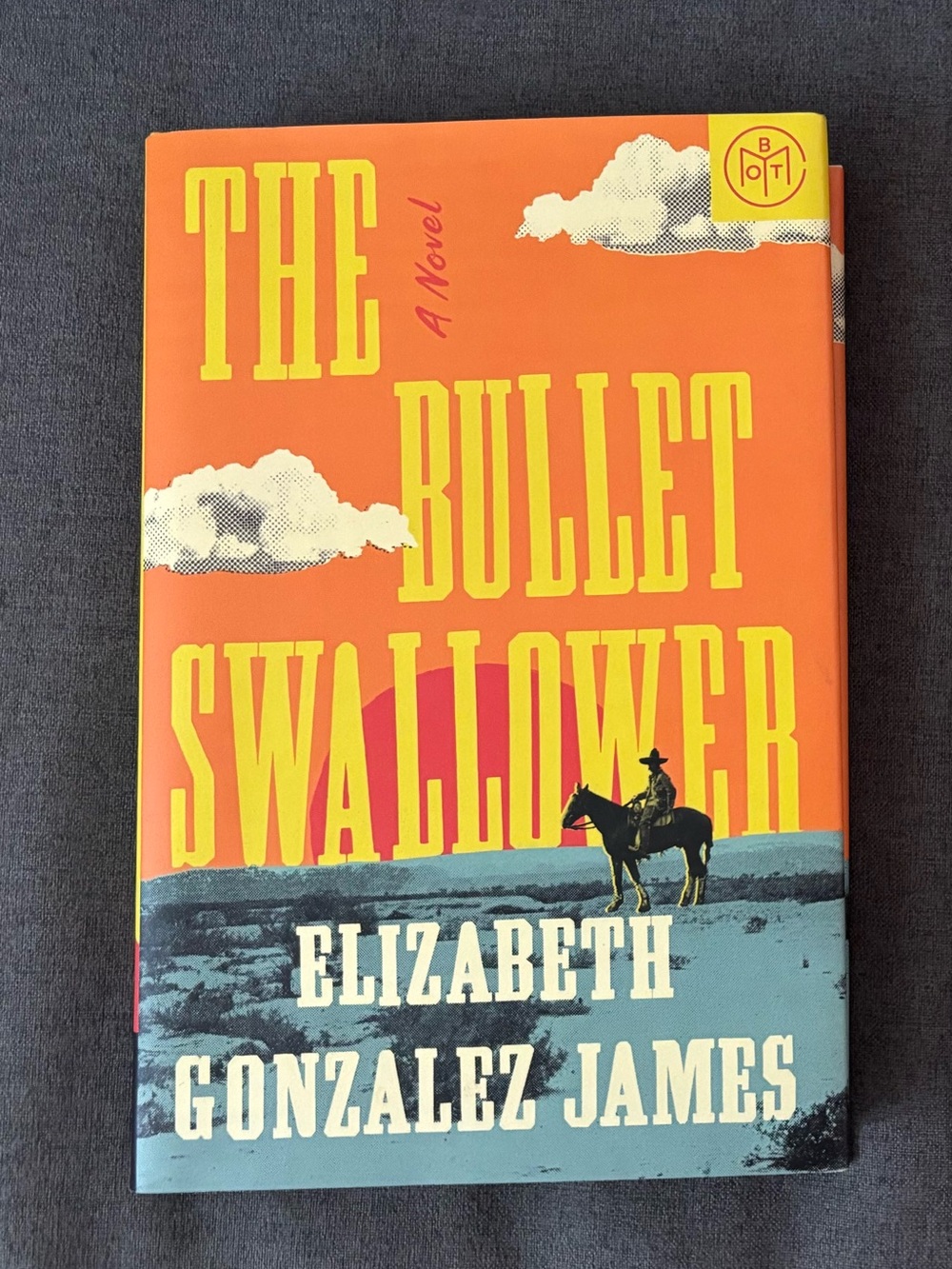The Bullet Swallower by Elizabeth Gonzalez James - Orange & Blue Hardcover